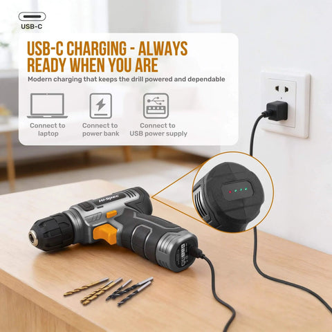 USB Rechargeable 8V Cordless Drill Set With Handy Lightweight Tool Kit For Everyday Home Repairs Furniture Assembly And DIY Projects In A Compact Toolbox Case With 1500mAh Battery And Easy Bit Changing, shown charging on a table with drill bits.