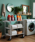 Heavy Duty Commercial Grade Utility Cart With Three Tiers And Handle Bar Steel Wire Rolling Cart With Wheels For Kitchen Workshop Or Food Storage NSF Listed Durable Plant Display Shelf Trolley Finnhomy next to washing machine in laundry room