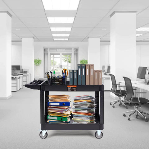 Heavy Duty 2 Shelf Utility Cart With 550 Lb Capacity And 360 Degree Swivel Wheels With Brakes in an office setting