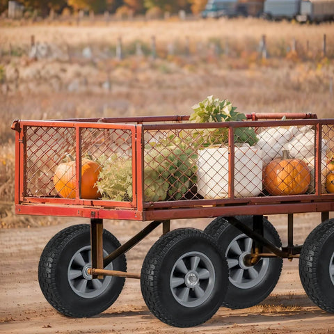 Utility cart with solid rubber tires and wheels, 10 inch flat free tubeless wheels, 5/8" axle bore hole, carrying pumpkins in a field