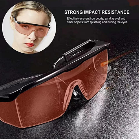 UVC 400 Blue Light Blocking Safety Glasses ANSI Z87 with red lenses on black surface and inset showing woman wearing glasses.