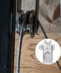 Close-up view of installed 4 Pack 2 Inch V Groove Wheel Pulley Set in 201 stainless steel with screws, supporting sliding gate cable.