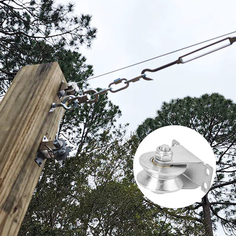 4 Pack 2 Inch V Groove Wheel Pulley Set In 201 Stainless Steel With Screws installed on a wooden post for outdoor sliding applications