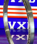VA035XP0 Thin Section Bearing 3.5" x 4" x 0.25" inch featuring nylon cage and open design, side view.