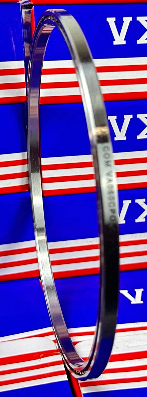 VA060CP0 Thin Section Bearing 6" x 6-1/2" x 1/4" - Slim Design side view on a backdrop of blue and red packaging.