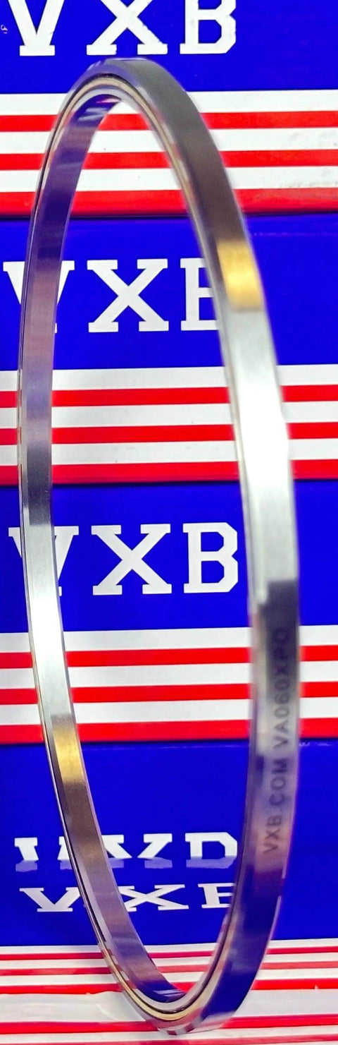 VA060XPO Thin Section Bearing ID 6" OD 6-1/2" Width 1/4" inch shown from the side against a vibrant blue background.