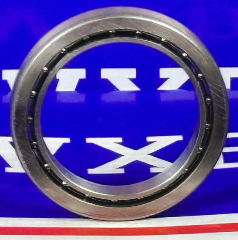 VAA10CL0 Thin Section Bearing - Slim 1" x 1.375" x 0.188" inch, open steel ball bearing side view.