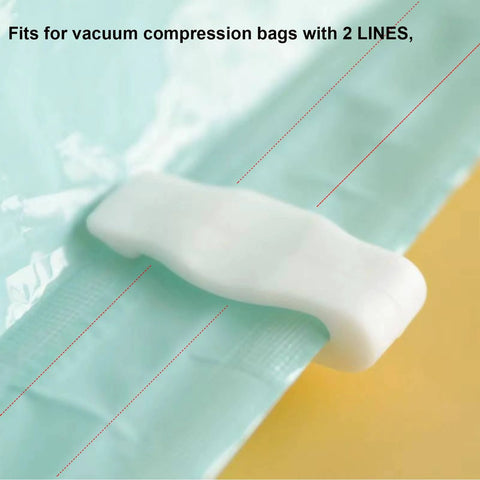 Close-up of a vacuum storage bag clip sealing a green bag. 10 Pack Vacuum Storage Bag Clips For Tight Seals And Easy Zipper Closure Space Saver Clips For Vacuum Bags Fits 2 Line Compression Bags Durable Plastic Seal Clips For Fresh Food Storage And Pantry Organization.