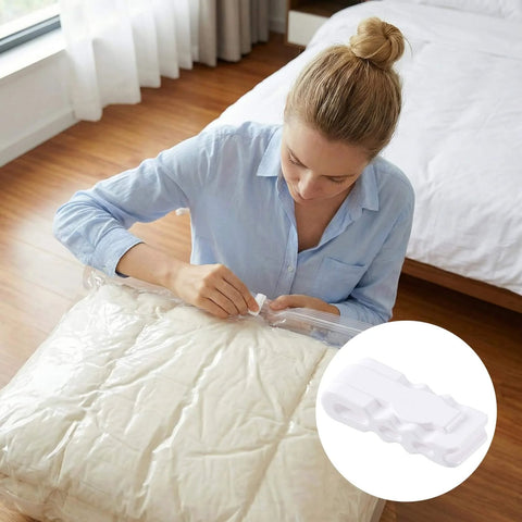 Person using 10 Pack Vacuum Storage Bags Sealing Clips Set Reusable Zipper Sealing Clips for Bags