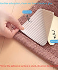 Person applying 4-Piece Vacuum Tech Rug Pad Grippers For Hardwood Floors And Under Rugs Tape on a carpet surface
