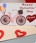 Valentines Day Bike Background Cutting Dies Set For Card Making And Scrapbooking, Balloon, Arrow And Flower Motifs, greeting card with bike and balloons.