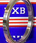 VC035CP0 Thin Section Bearing 3-1/2" x 4-1/4" x 3/8" inch displayed from a side view on a colored background.