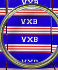 VD060CP0 Thin Section Bearing 6x7x1/2" Slim, circular steel ring with brass cage, displayed against colorful VXB boxes.