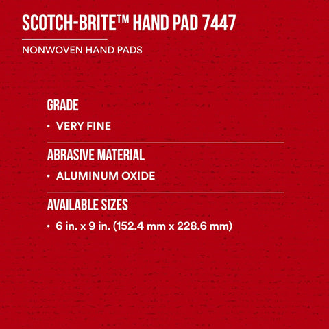 Red packaging of Scotch-Brite hand pad 7447 showing aluminum oxide, very fine grade, 6x9 inch size for cleaning and scuffing.