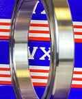 VF045CP0 Thin Section Bearing 4-1/2" x 6x3/4" inch, chrome steel, side view, showcasing smooth surface and design.