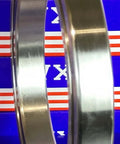 VG065CP0 Thin Section Bearing 6-1/2" x 8-1/2" x 1 inch displayed on a blue and red background, showcasing its chrome steel finish.