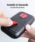 Hands applying Ultra Strong 3M VHB 5952 Adhesive Circles, 1 Inch Round, 25 Pack to a device, showcasing usage and installation.