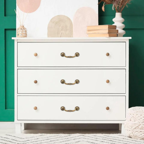 White dresser with set of six vintage bail pull handles in antique bronze alloy for cabinets and drawers, 4 inch hole center.