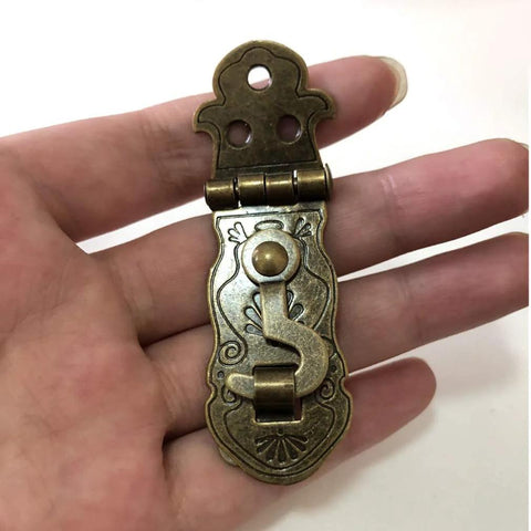 2 Pcs Vintage Style Notebook Hasp Set Bronze Tone Iron Antique Box Latch With Screws shown handheld, ornate design visible