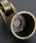Close-up of Vintage Bronze Swivel Cup Caster from set 4 pieces, zinc alloy construction for furniture hardware.