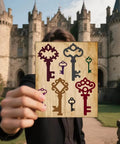 Retro Keys Cutting Dies Set For Scrapbooking And Card Making, Delorigin 16pcs held in front of a castle background