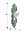 2 Pack Vintage Cabinet Knob Set With Distressed Pewter Finish And Clear Resin Knob on ornate matte green backplate