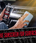 Person using VRP Vinyl Rubber And Plastic Dressing For Tires Trim And Surfaces Delivers A Non Greasy Dry To The Touch Shine That Restores Rich Depth To Tires Bumpers Dashboards And More Safe For Cars Trucks SUVs RVs 16 Oz on car dashboard