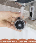Hand cleaning a wheel from the 4 Pack Universal Walker Replacement Wheels For Strollers And Learning Walkers under a tap