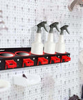 Wall Mounted Spray Bottle Rack With Five Hooks Heavy Duty Cold Rolled Steel Organizer holding bottles in garage