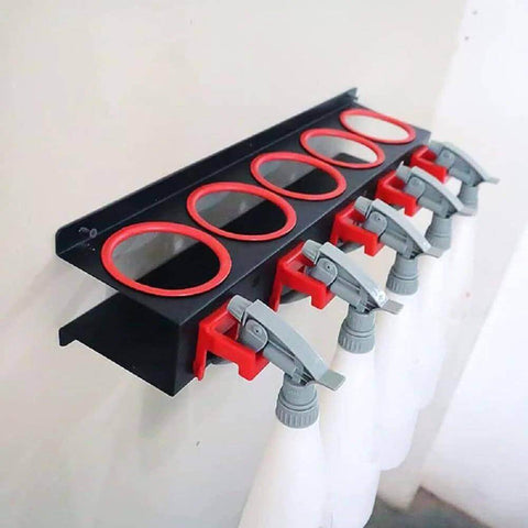 Wall Mounted Spray Bottle Rack With Five Hooks Heavy Duty Cold Rolled Steel Organizer holding spray bottles in use on wall