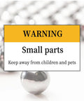 Close-up of Hundred Piece Set Of Three Eighth Inch Hardened Chrome Steel Bearing Balls for DIY with warning about small parts.