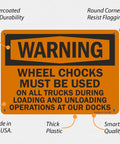 Warning Sign Wheel Chocks Required On All Trucks During Loading And Unloading At Our Docks Stay Safe 10 X 14 Inch Plastic Sign Durable HDPE Recyclable Base With Rounded Corners SmartSign displayed with annotations for durability and quality features.