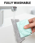 Hand washing a Window Groove Cleaning Brush Set with Magic Track Cleaner Mini Brush under tap water
