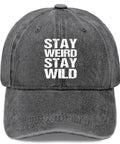 Front view of Washed Distressed Baseball Cap For Women With Adjustable Strap Comfortable Fit And Versatile Style In Light Grey with 'Stay Weird Stay Wild' text.