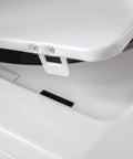 Close-up view of the hinge detail on the Compact 27 inch unitized washer and electric dryer in one space-saving cabinet.