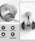 Waterproof and rustproof stainless steel wall mount with heavy duty suction for tools, shown holding weights against marble wall.
