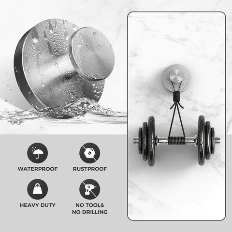 Waterproof and rustproof stainless steel wall mount with heavy duty suction for tools, shown holding weights against marble wall.