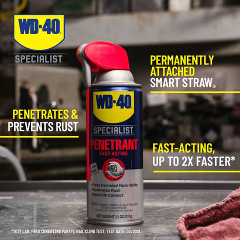 Fast rust relief penetrant with Smart Straw on workshop table.