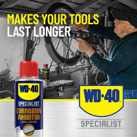 Man using Long Lasting Anti Rust Spray For Metal Parts That Keeps Rust Away Indoors Up To Two Years And Outdoors Up To One Year 6.5 Oz WD-40 Specialist Corrosion Inhibitor
