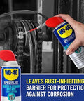 Using WD-40 Specialist White Lithium Grease Spray with SMART STRAW SPRAYS 2 WAYS, 10 OZ on mechanical gears for rust protection.
