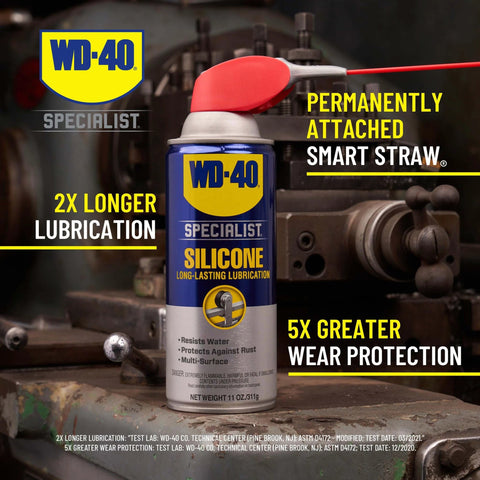 Image of WD-40 Specialist Silicone Lubricant with SMART STRAW SPRAYS 2 WAYS, 11 OZ can on a metal surface, highlighting features.