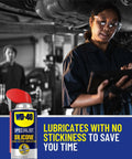 WD-40 Specialist Silicone Lubricant with SMART STRAW SPRAYS 2 WAYS, 11 OZ can in workshop, worker using tablet