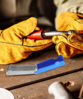 Worker using Stainless Steel Welding Nozzle Tip Cleaner Kit 13 Piece High Temp Resistant Torch Cleaning Set For Gas Welding Arc Welding Outdoor Repairs And Essential Welding Gear near welding area.