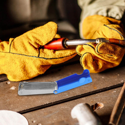 Worker using Stainless Steel Welding Nozzle Tip Cleaner Kit 13 Piece High Temp Resistant Torch Cleaning Set For Gas Welding Arc Welding Outdoor Repairs And Essential Welding Gear near welding area.
