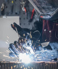 Welder using All Position Rutile E6013 Welding Rod For Carbon Steel, Three Thirty Second Inch, Five Pound Electrodes, AC DC Ready by YesWelder.