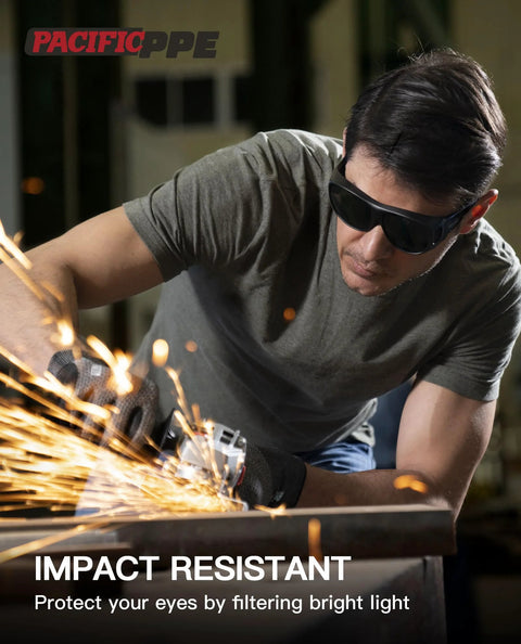 Man wearing Welding Safety Glasses ANSI Z87 IR Shade 5 Wraparound Lenses UV Protection using a grinder