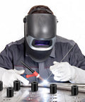 Welder using Welding Table Fixture Pins Five Eighths Inch By One Inch By One And A Half Inch Quick Setup Clamps in metal project