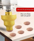 Wet and dry grinding wheel drilling holes in wood surface
