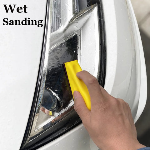 Using Detail Sander Paper Kit 70Pcs Wet Dry Sandpaper With 3 5 By 1 Inch Hand Block on car headlight