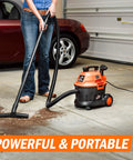 Wet Dry Vacuum, Two Point Five Gallon, 2 Peak HP, 120 Volt AC, Portable Compact Utility Vacuum With Blower in use on garage floor.